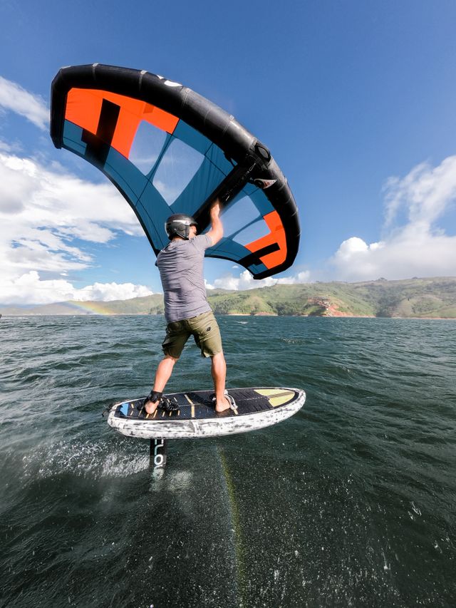 Wingfoil coach and rider using BbTalkin waterproof intercoms