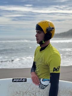 Ben Neumann adaptive surfing with BbTalkin waterproof communication system on the beach