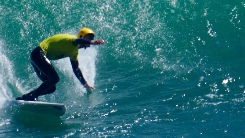 BbTalkin Surf Cap Headset worn by adaptive surfer Ben Neumann