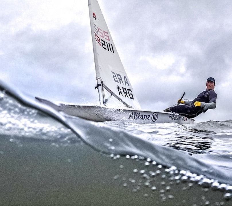 Francisco Guaragna Argentine Olympic sailor wearing BbTalkin headset on the water